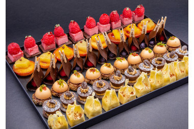 Caterer on booth Platter of Mignardises